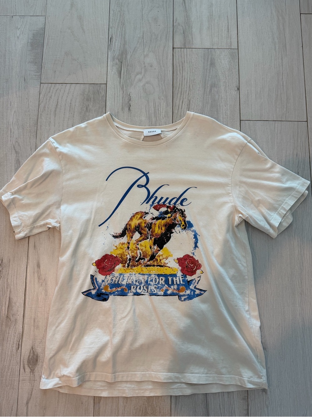 Rhude Cream Short-Sleeve Tee with Blue Script and Red Rose Graphics